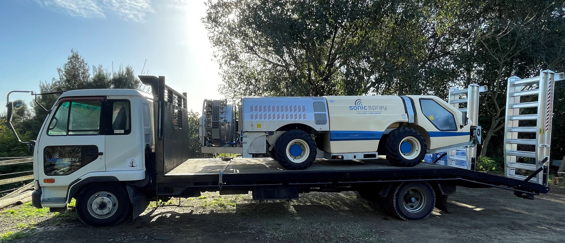 banner sonic spray vehcile on truck